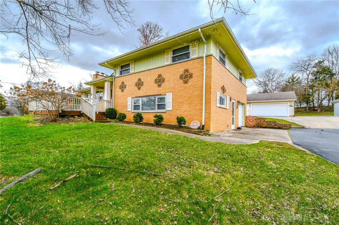 Property Photo:  7535 Peters Pike  OH 45414 