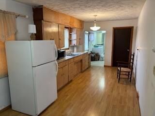 Property Photo: 208 Basswood Avenue NW MN 56633
