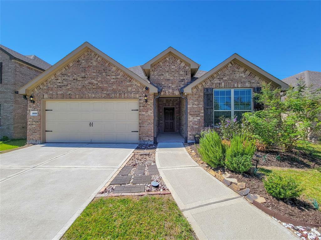 Property Photo: 11119 Santiago River Lane TX 77406
