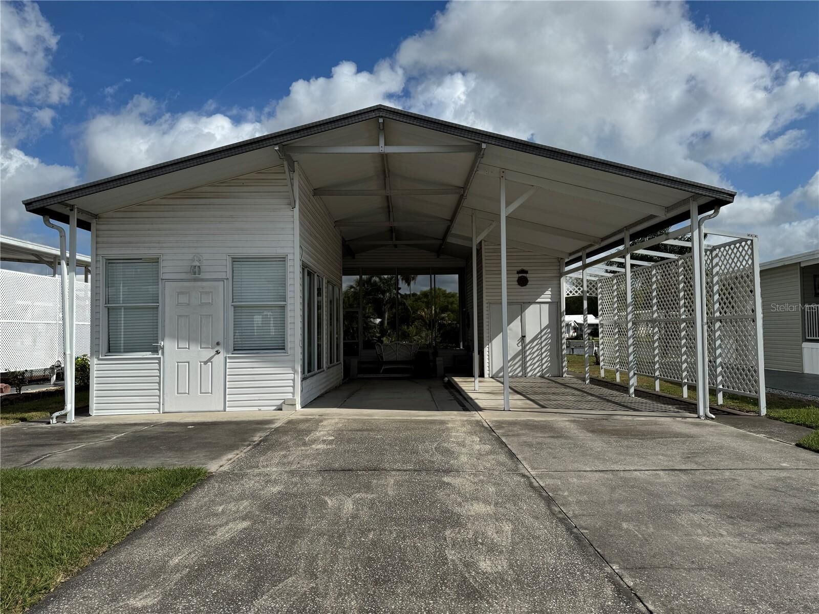 Property Photo:  35207 Condominium Boulevard Lot 52  FL 33541 