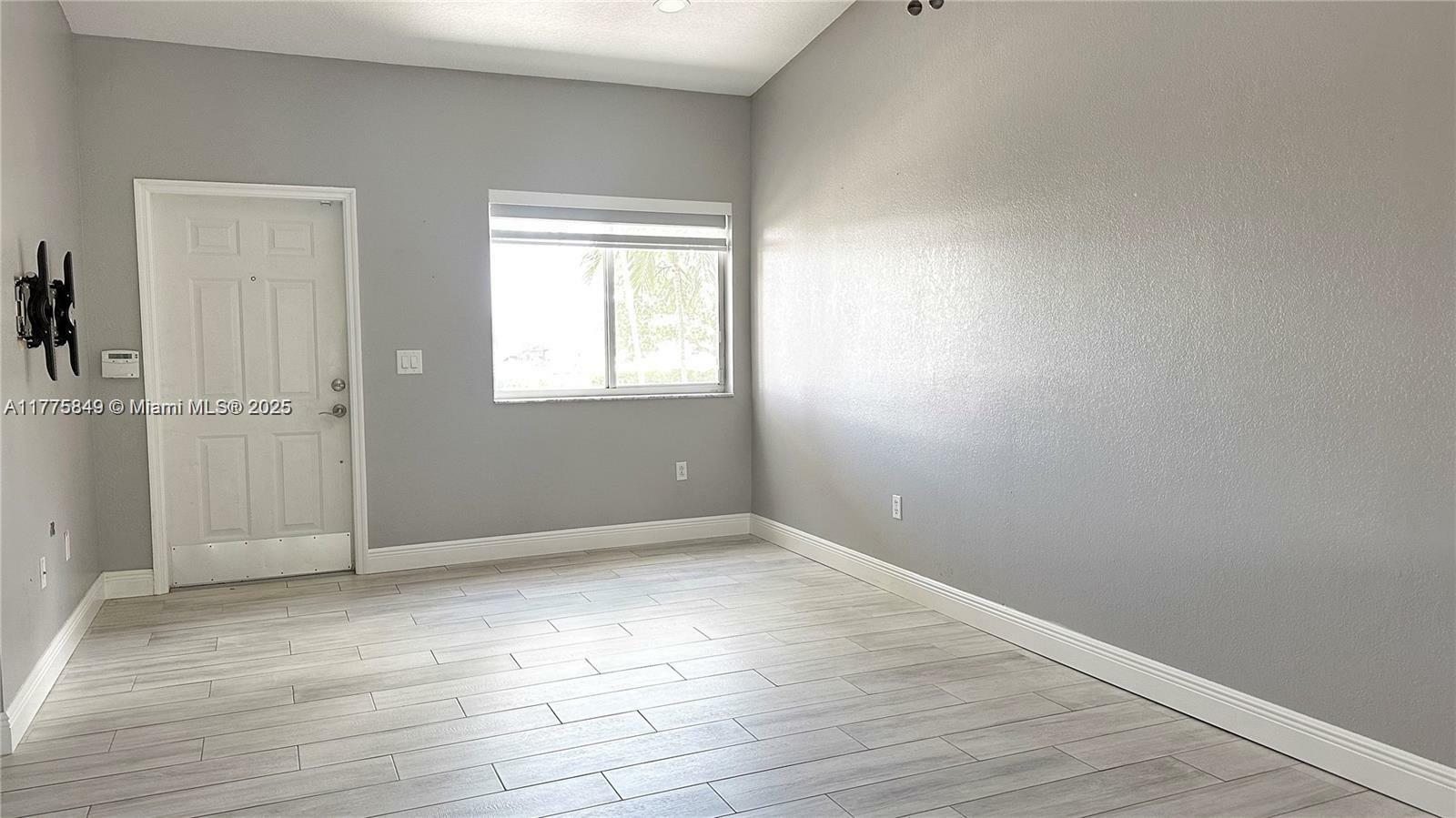 Property Photo: 7910 NW 7th 203 FL 33024