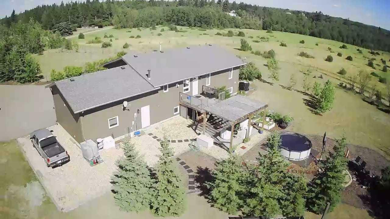 Property Photo: 262009 Township Rd 422 AB T4J 1R3