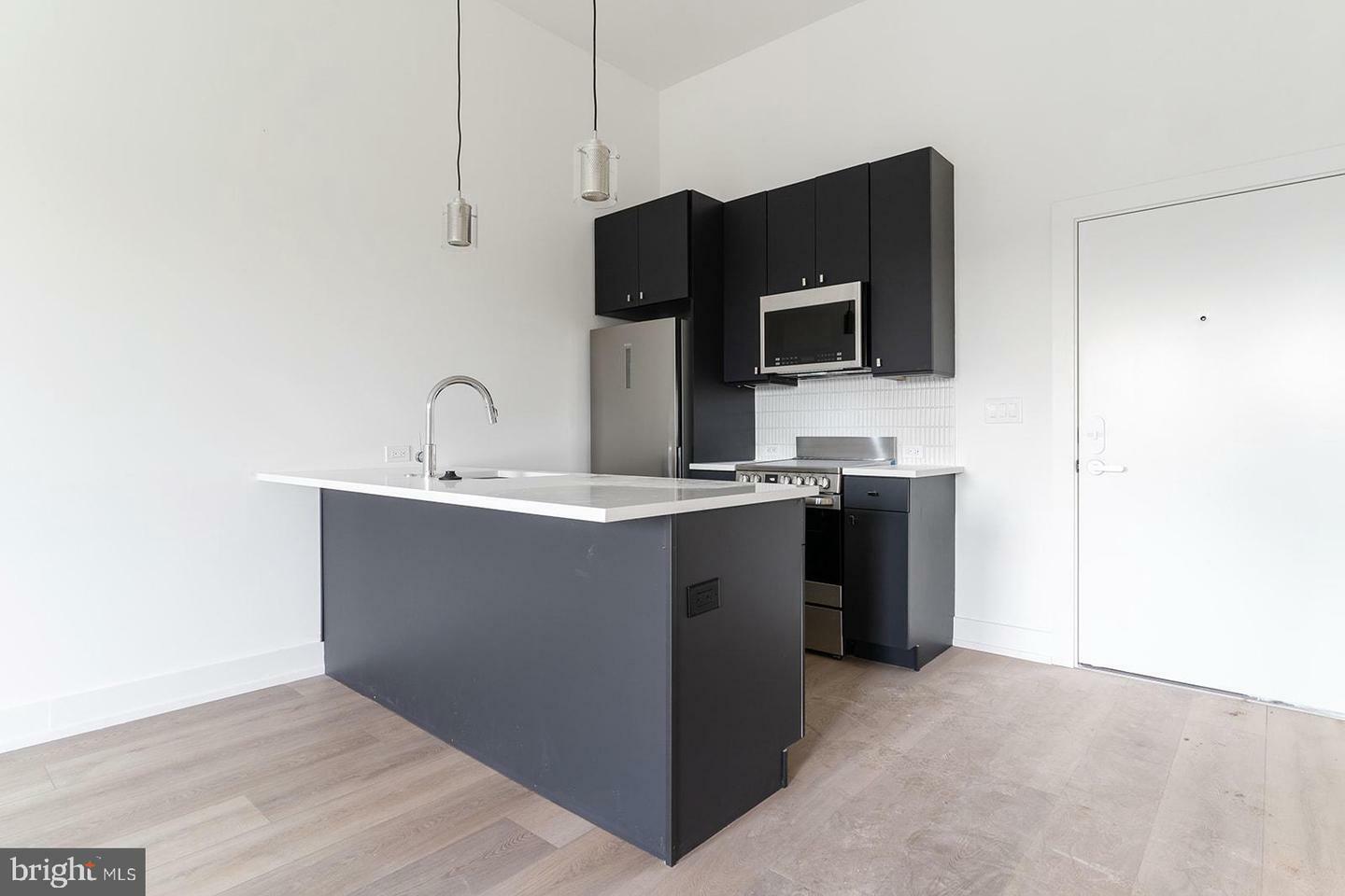 Property Photo:  5013 Springfield Avenue 504  PA 19143 