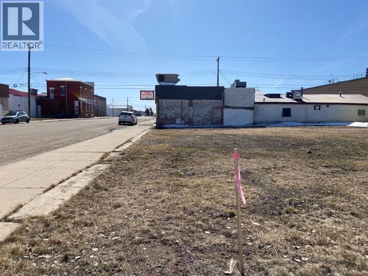 Property Photo:  305307 1 Street West  AB T0J 1P0 