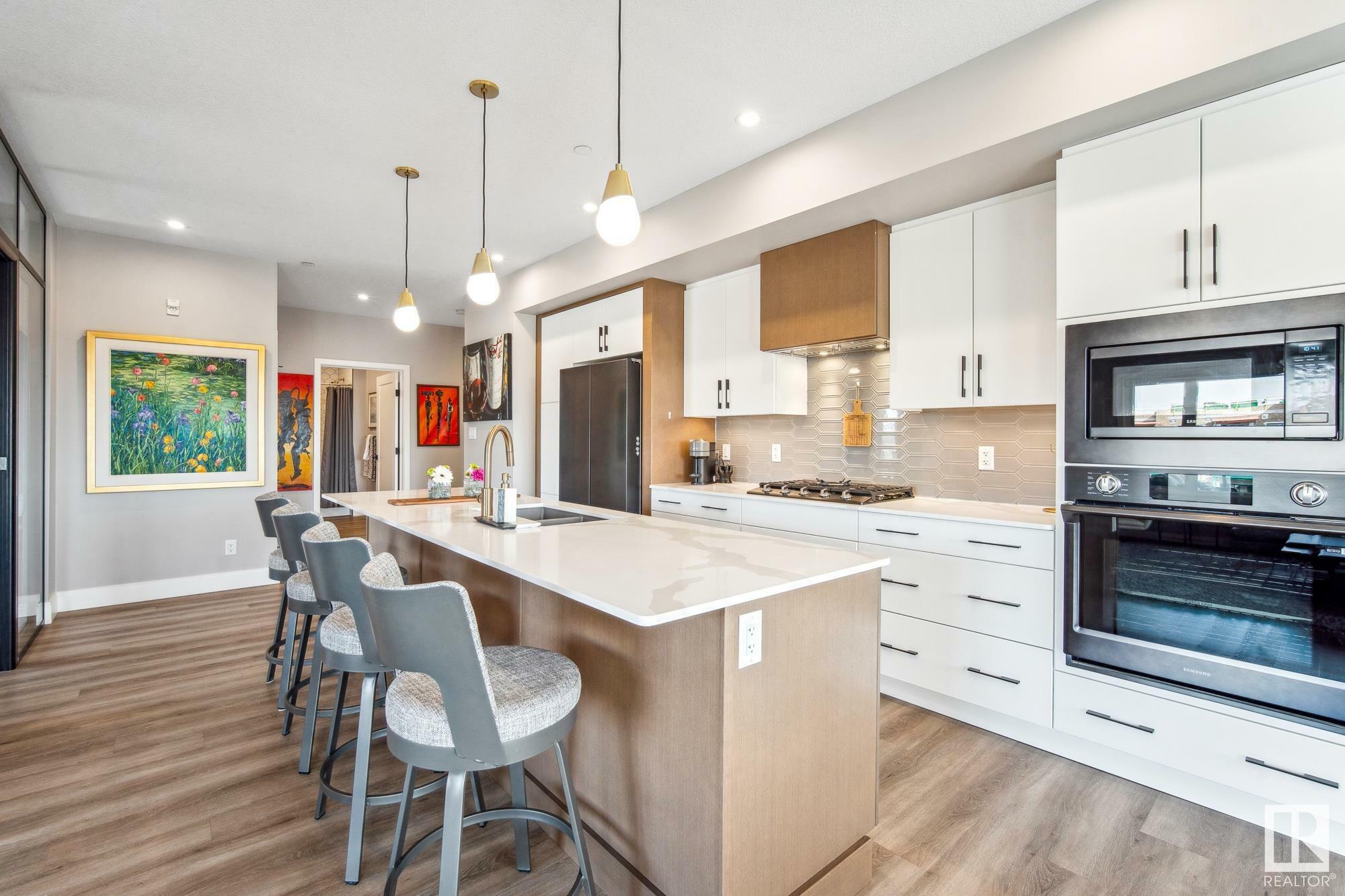Property Photo: 7463 May Common NW 418 AB T6R 0X1