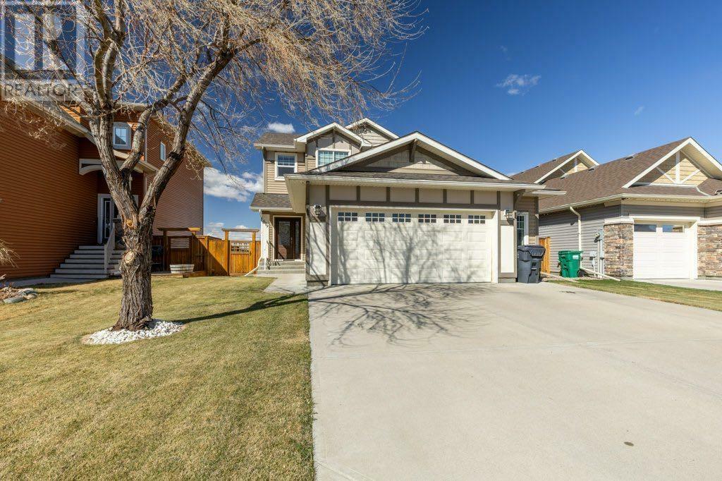Property Photo: 679 Marie Van Haarlem Crescent North AB T1H 6Y9