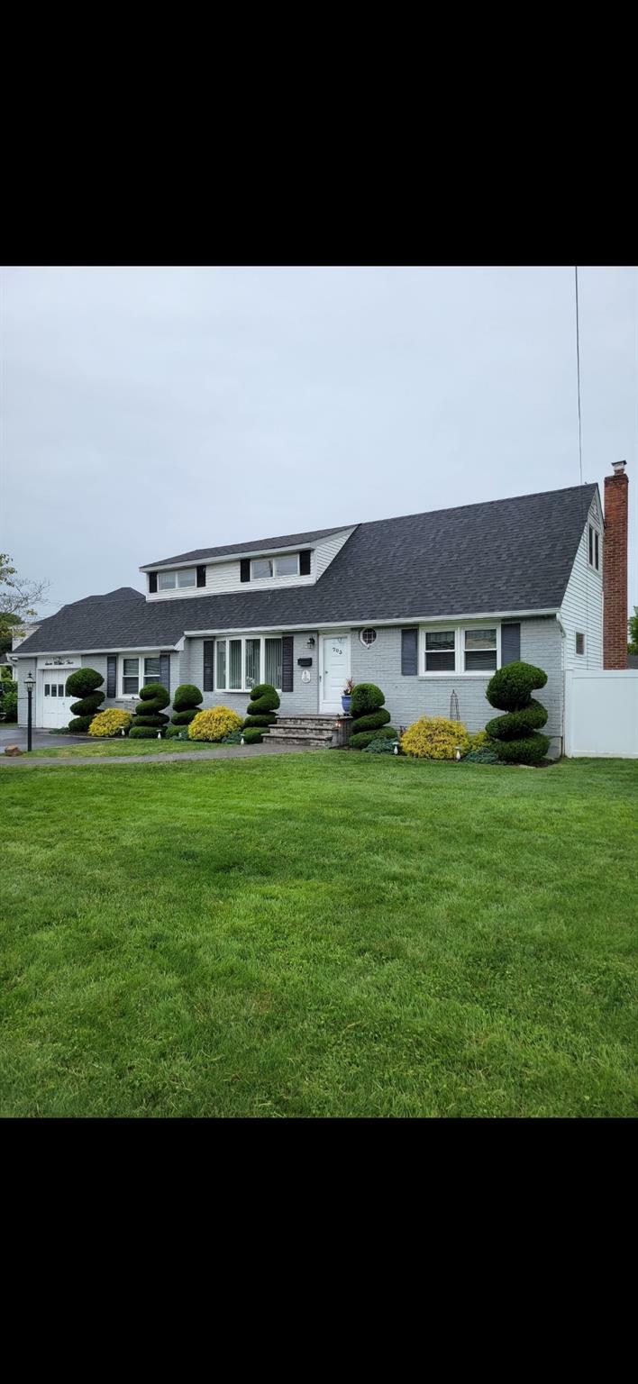 Property Photo:  703 Pine Avenue  NY 11795 