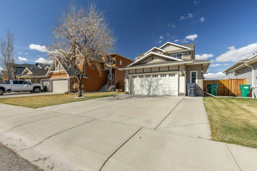 Property Photo: 679 Marie Van Haarlem Crescent N AB T1H 6Y9