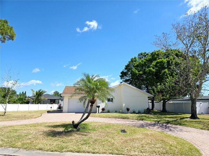 Property Photo: 8719 Sunlit Cove Drive NE FL 33702
