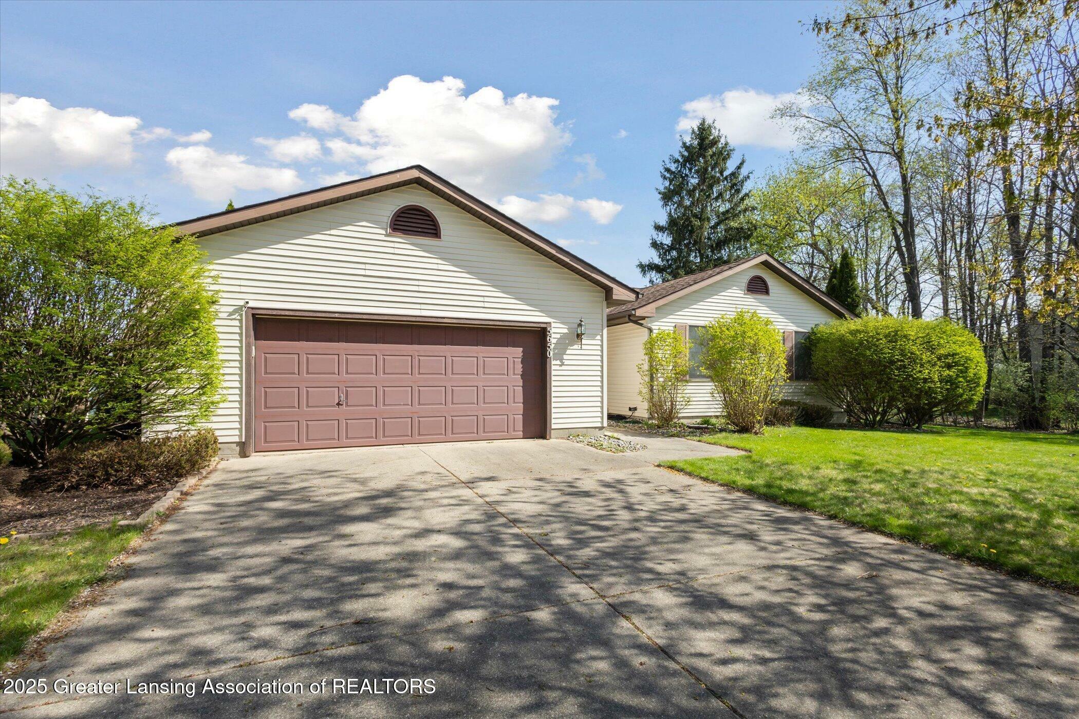 Property Photo: 5650 Lochwoode Court MI 48842