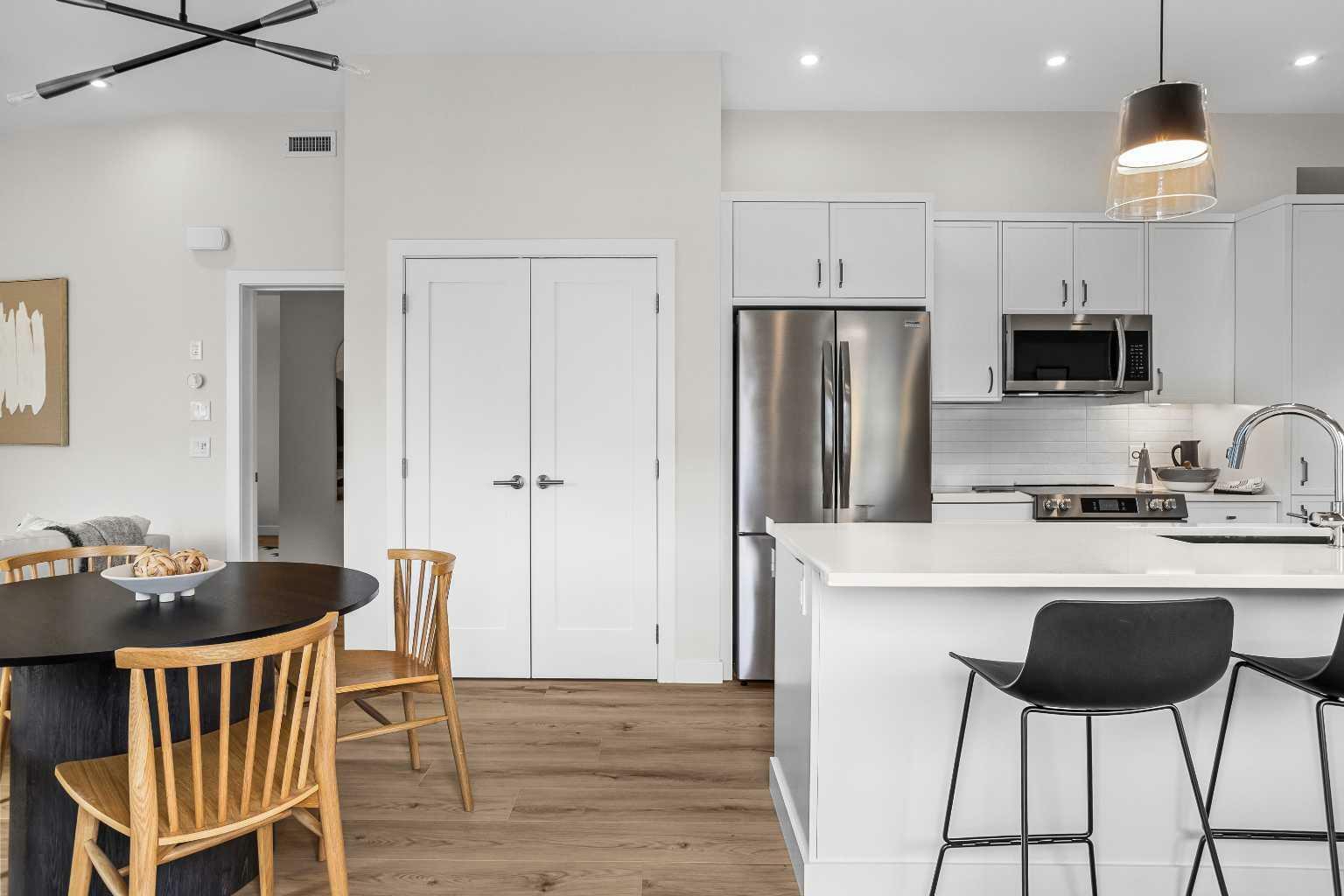 Property Photo: 209 Stewart Creek Rise 101L AB T1W 0N9