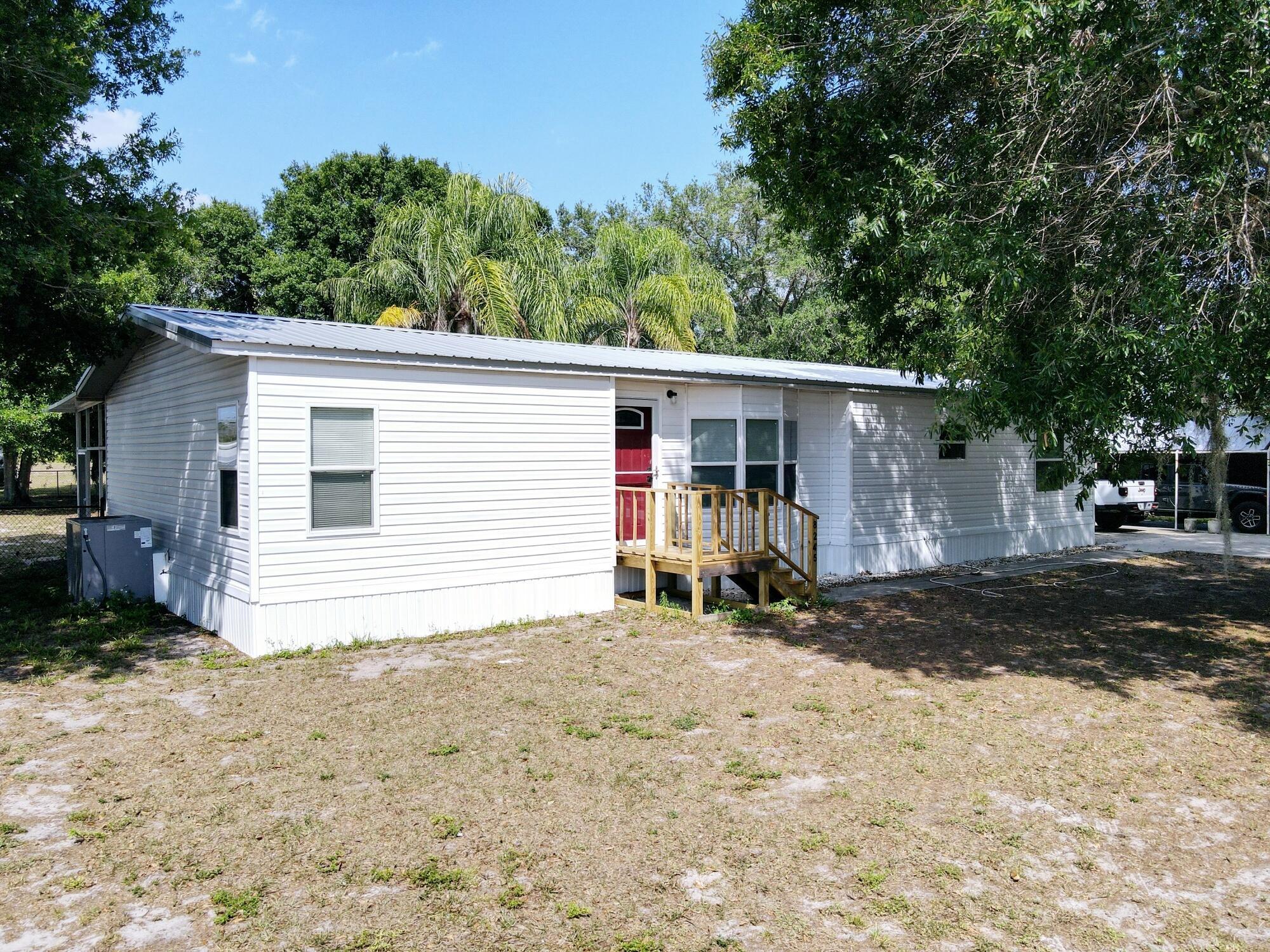 Property Photo: 8245 SE 57th Drive FL 34974