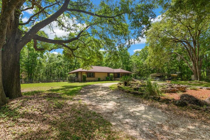 Property Photo:  23725 NW 142nd Avenue  FL 32643 