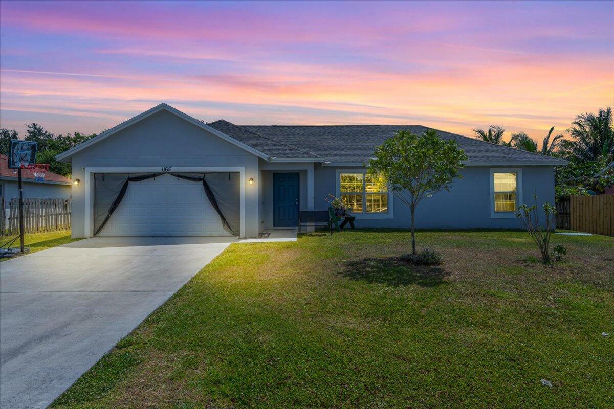 Property Photo: 1165 SW Empire Street FL 34983