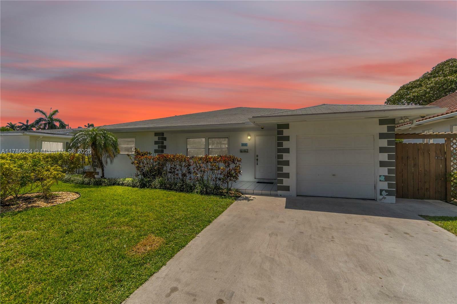 Property Photo:  806 NE 4th St  FL 33009 
