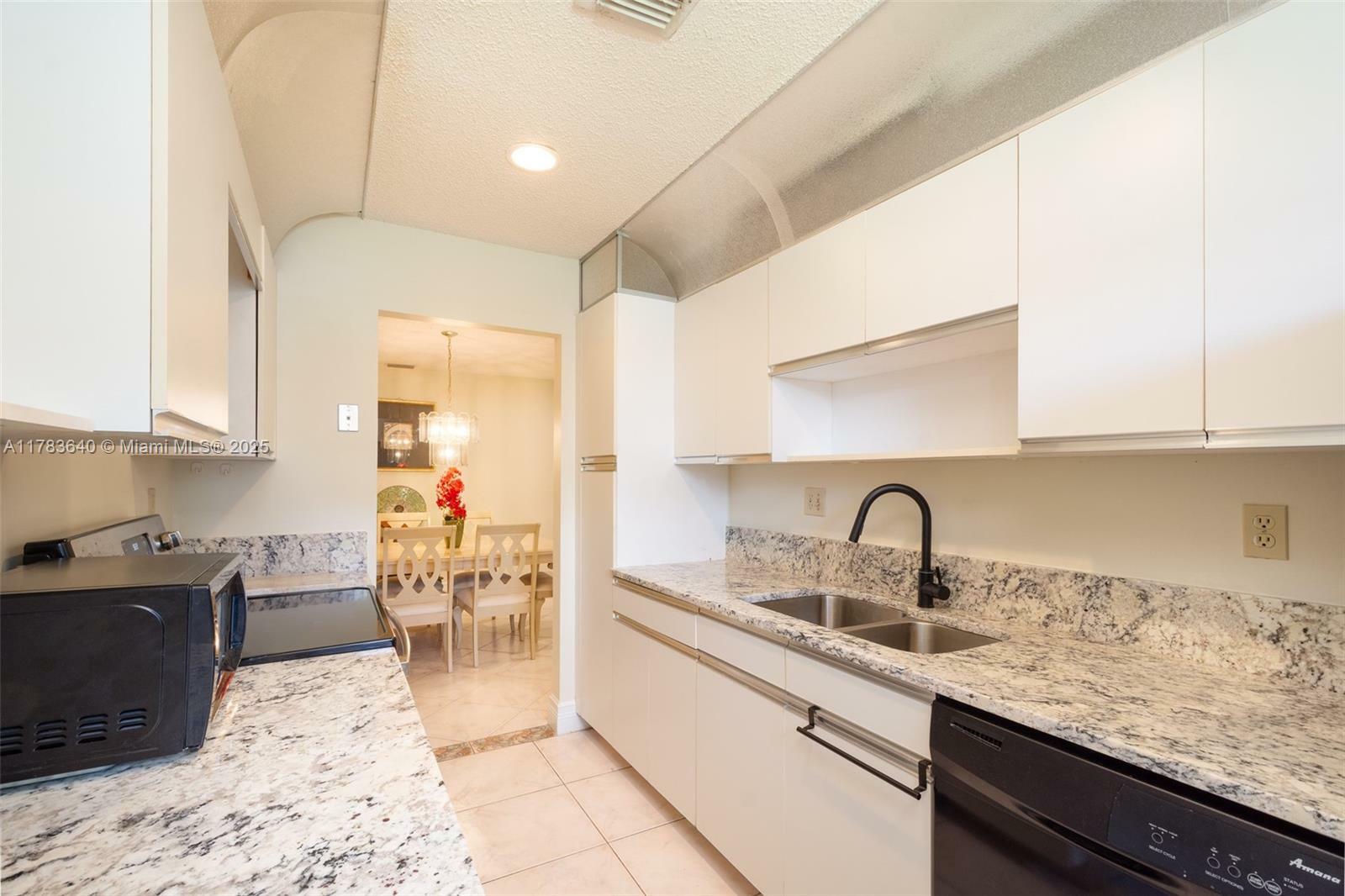 Property Photo: 13940 Nesting Way C FL 33484