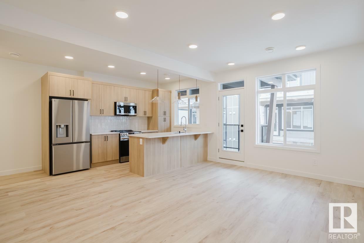Property Photo: 16231 19 Avenue SW 17 AB T6W 5C6