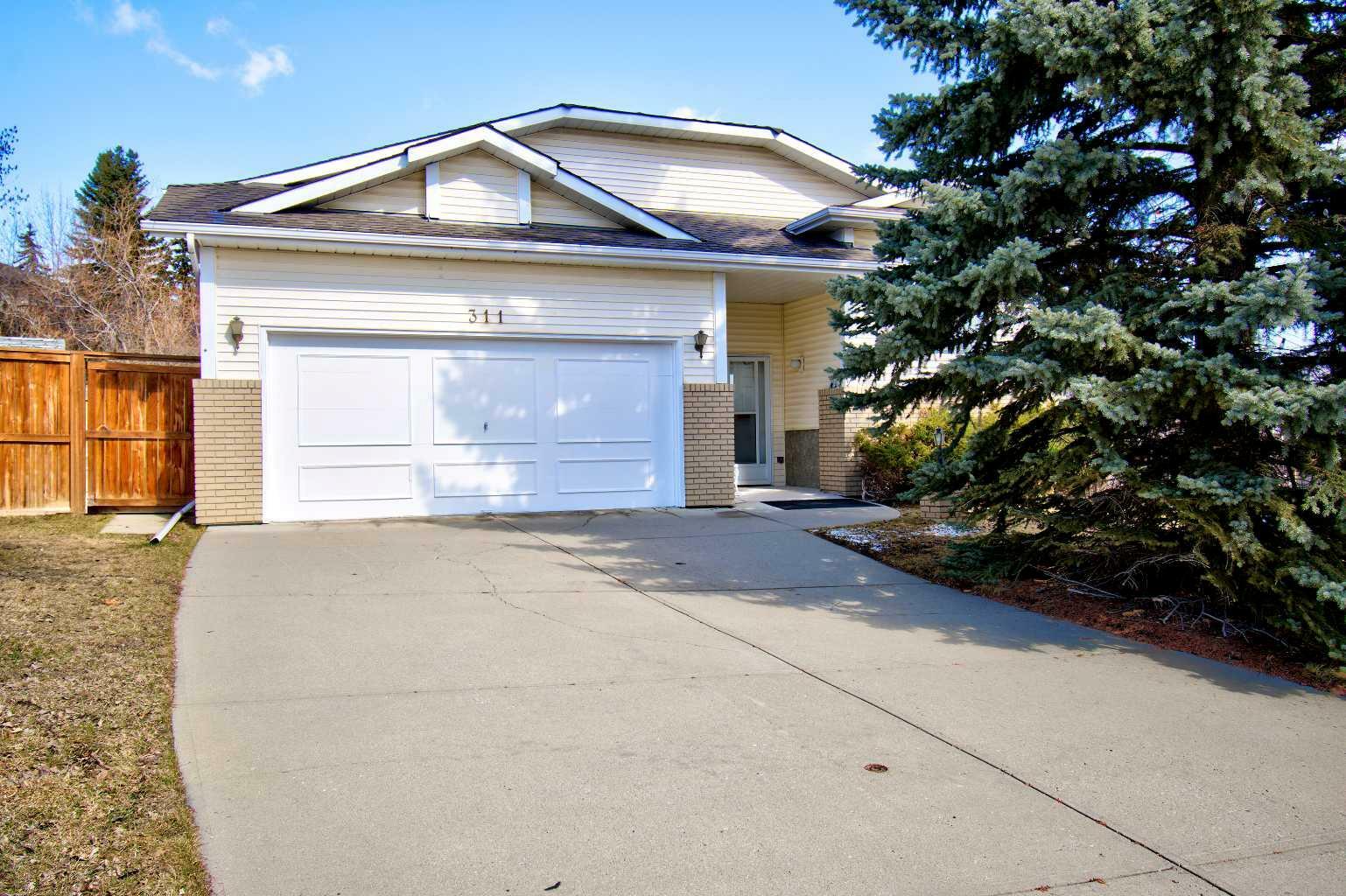 Property Photo: 311 Signal Hill Place SW AB T3H 2M5