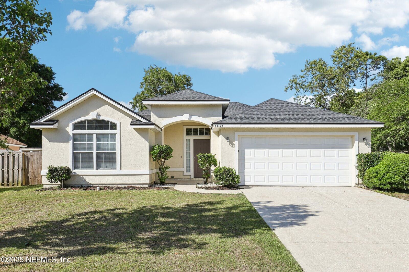 Property Photo:  86123 Red Holly Place  FL 32097