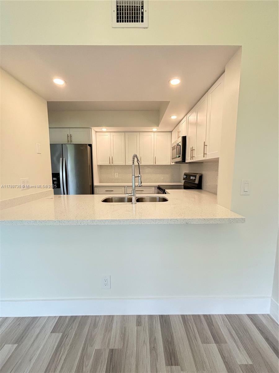 Property Photo: 100 SW 130th Ter 303C FL 33027