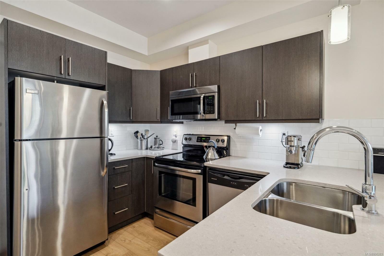 Property Photo: 317 Burnside Rd E 105 BC V9A 1A6