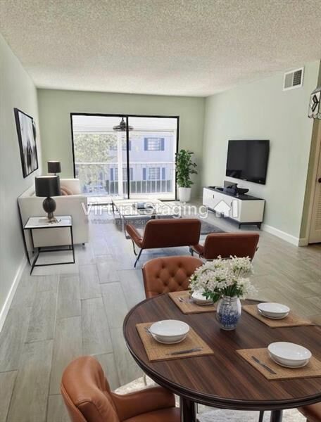 Property Photo: 130 Cypress Club Dr 323 FL 33060