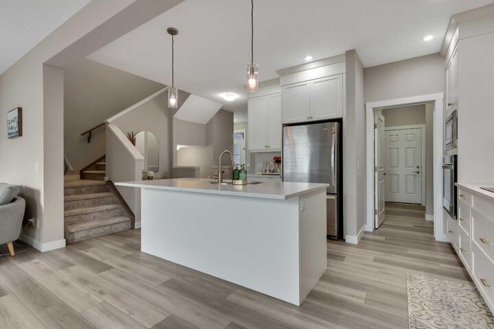 Property Photo:  216 Creekstone Row SW  AB T2X 4Y5 