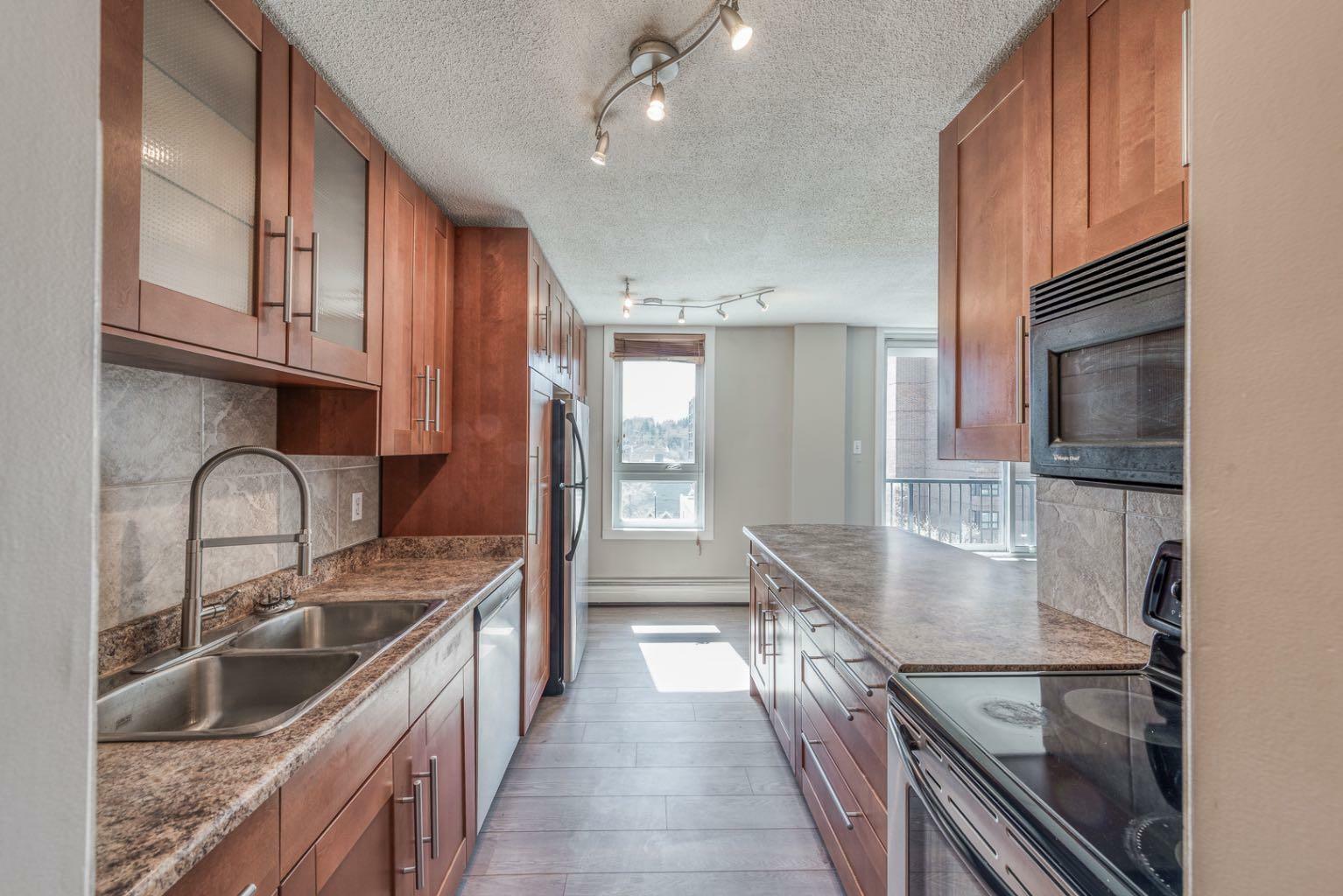 Property Photo: 1015 14 Avenue SW 605 AB T2R 0N9