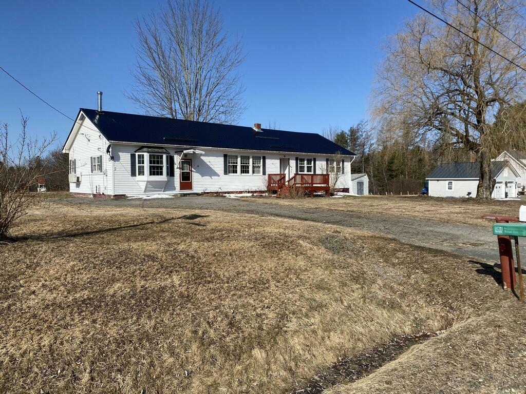 Property Photo: 48 Medway Road ME 04459