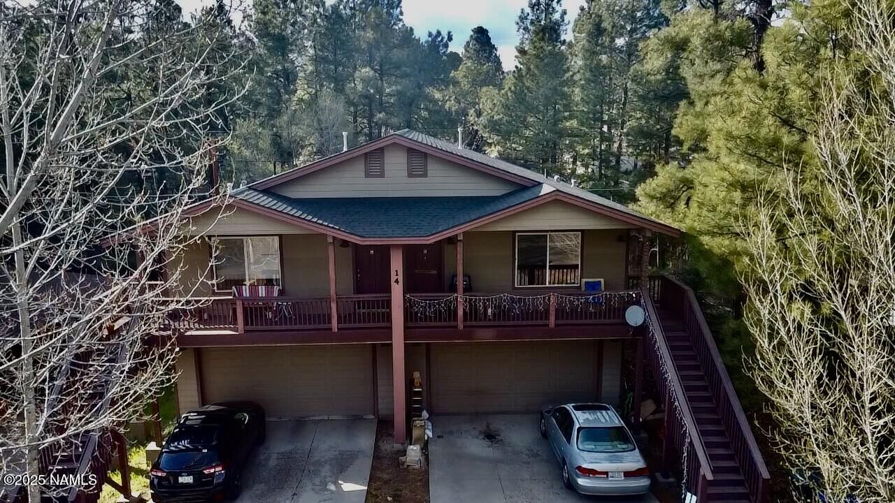 Property Photo: 14 S Trail Of The Woods AZ 86001