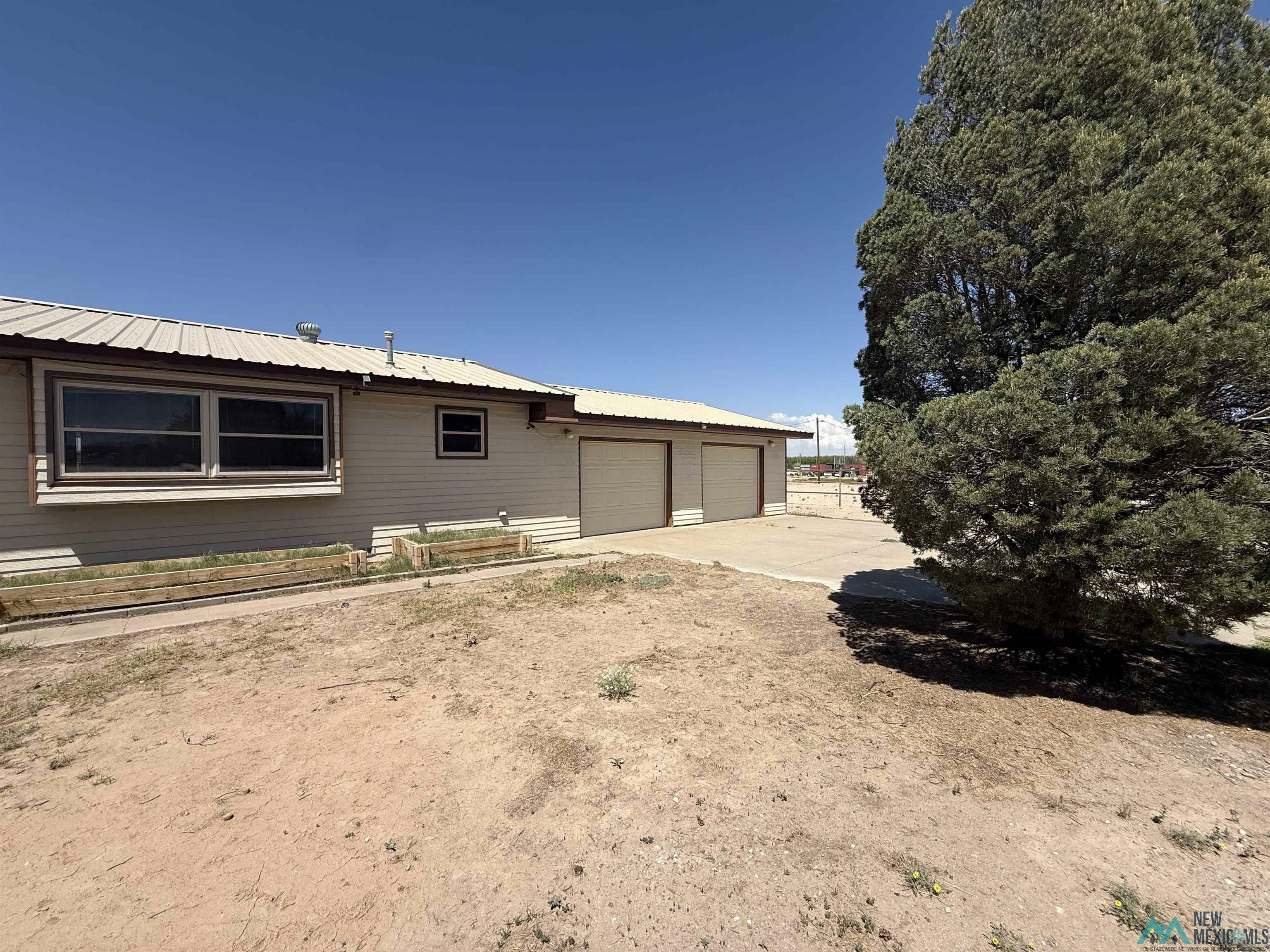 Property Photo: 910 W Fairgounds Road NM 88210