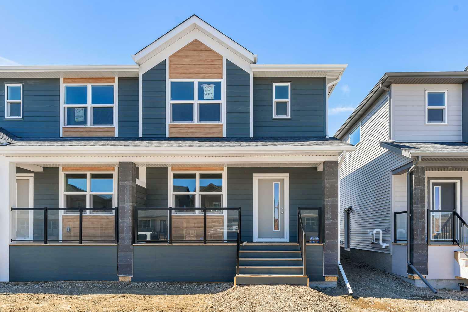 Property Photo: 667 Wolf Willow Boulevard SE AB T2X 5S1
