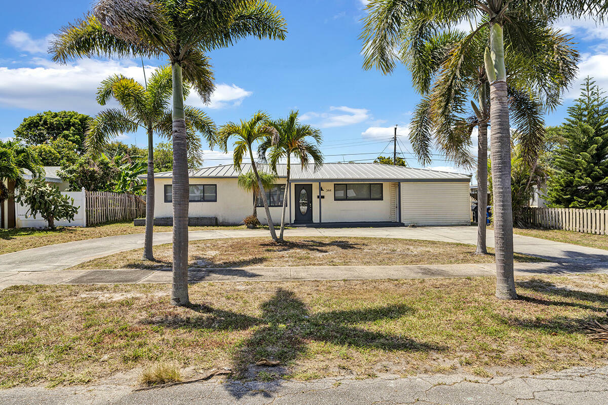 Property Photo: 344 E Jasmine Drive FL 33403