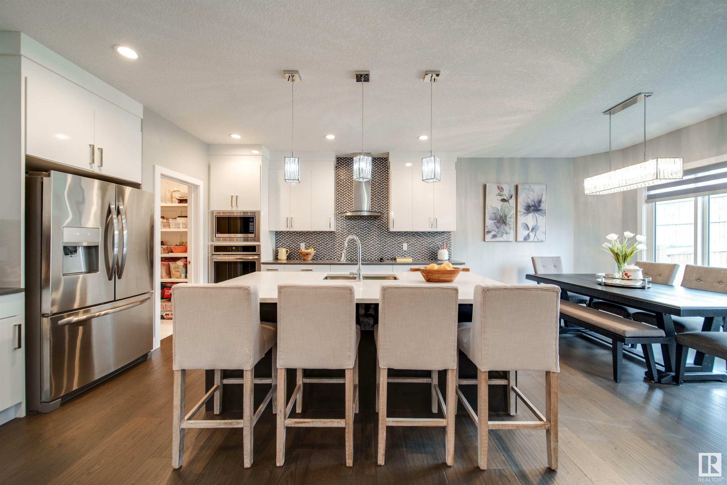 Property Photo: 1216 152 Avenue NW AB T5Y 0Z5