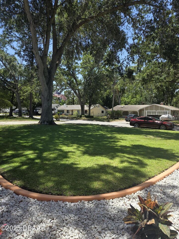Property Photo:  1013 Indian Oaks E  FL 32117 