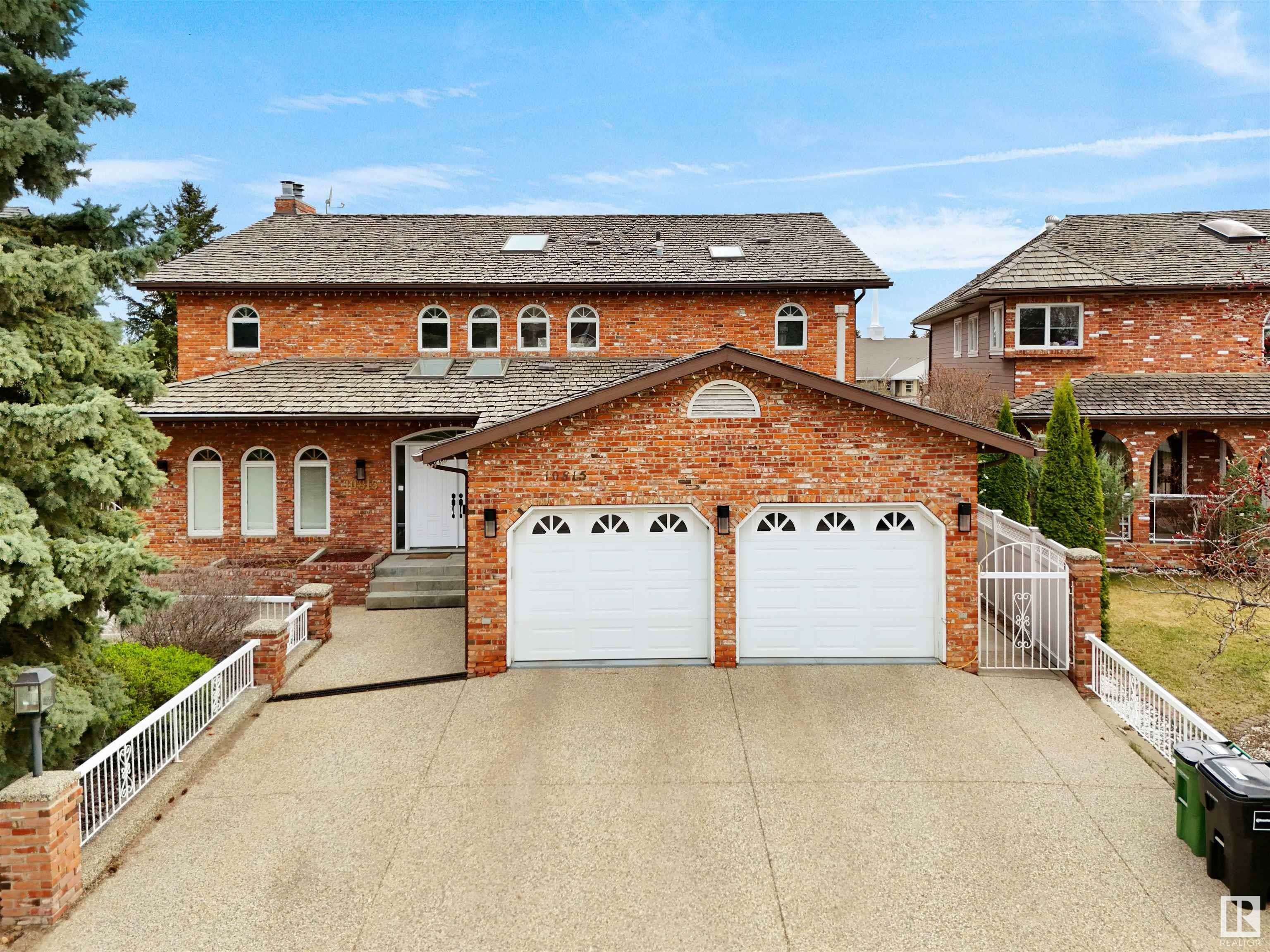 Property Photo: 10815 Bearspaw NW AB T6J 5E1