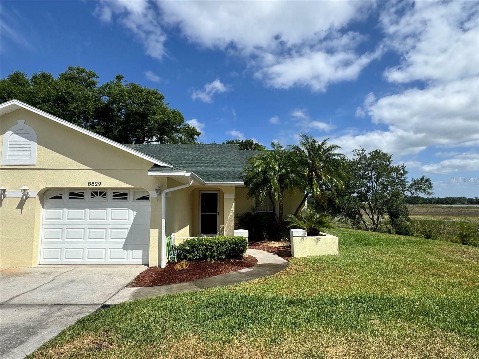 Property Photo: 8829 Courtyard Lane FL 34736