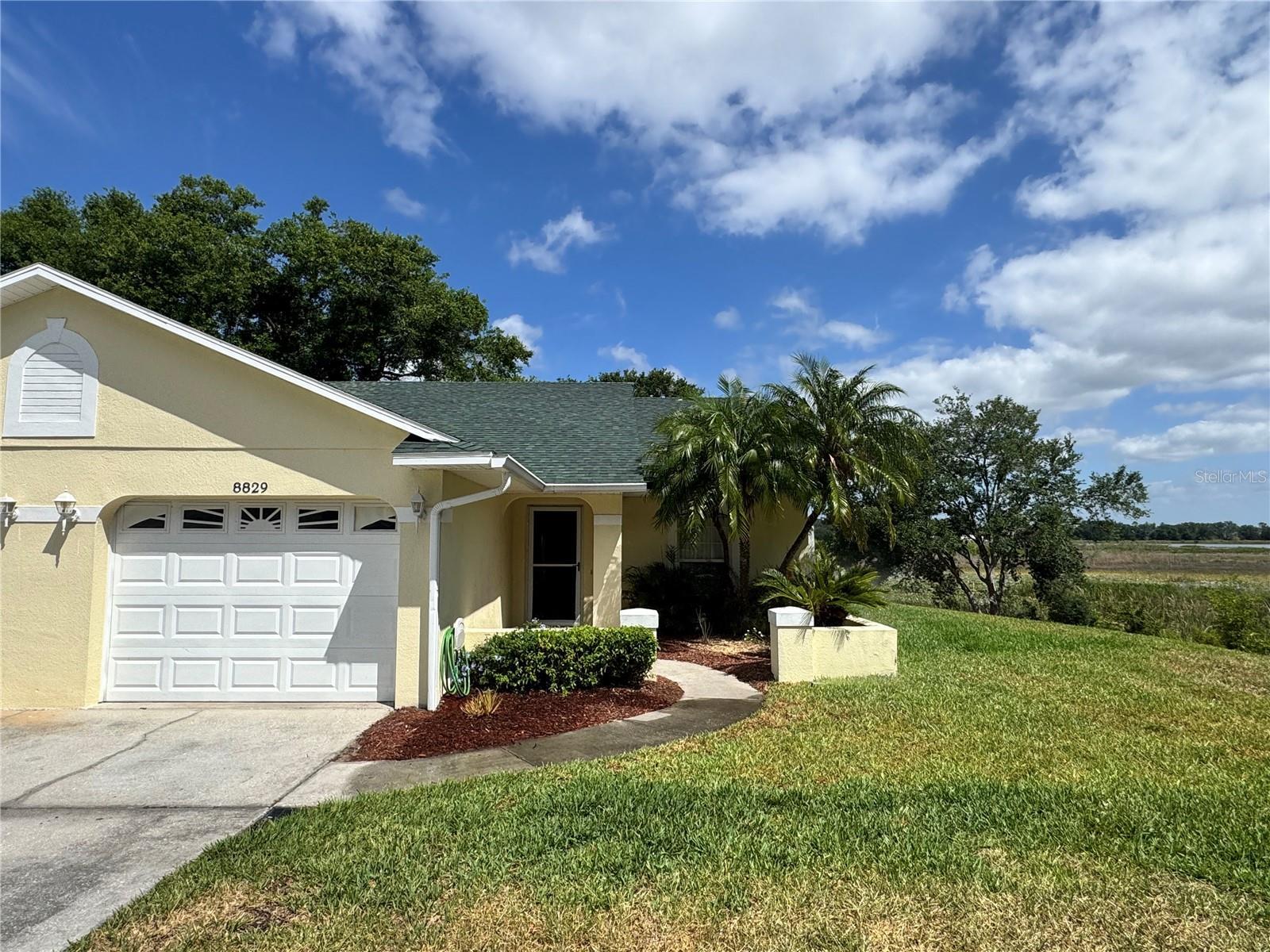 Property Photo: 8829 Courtyard Lane FL 34736
