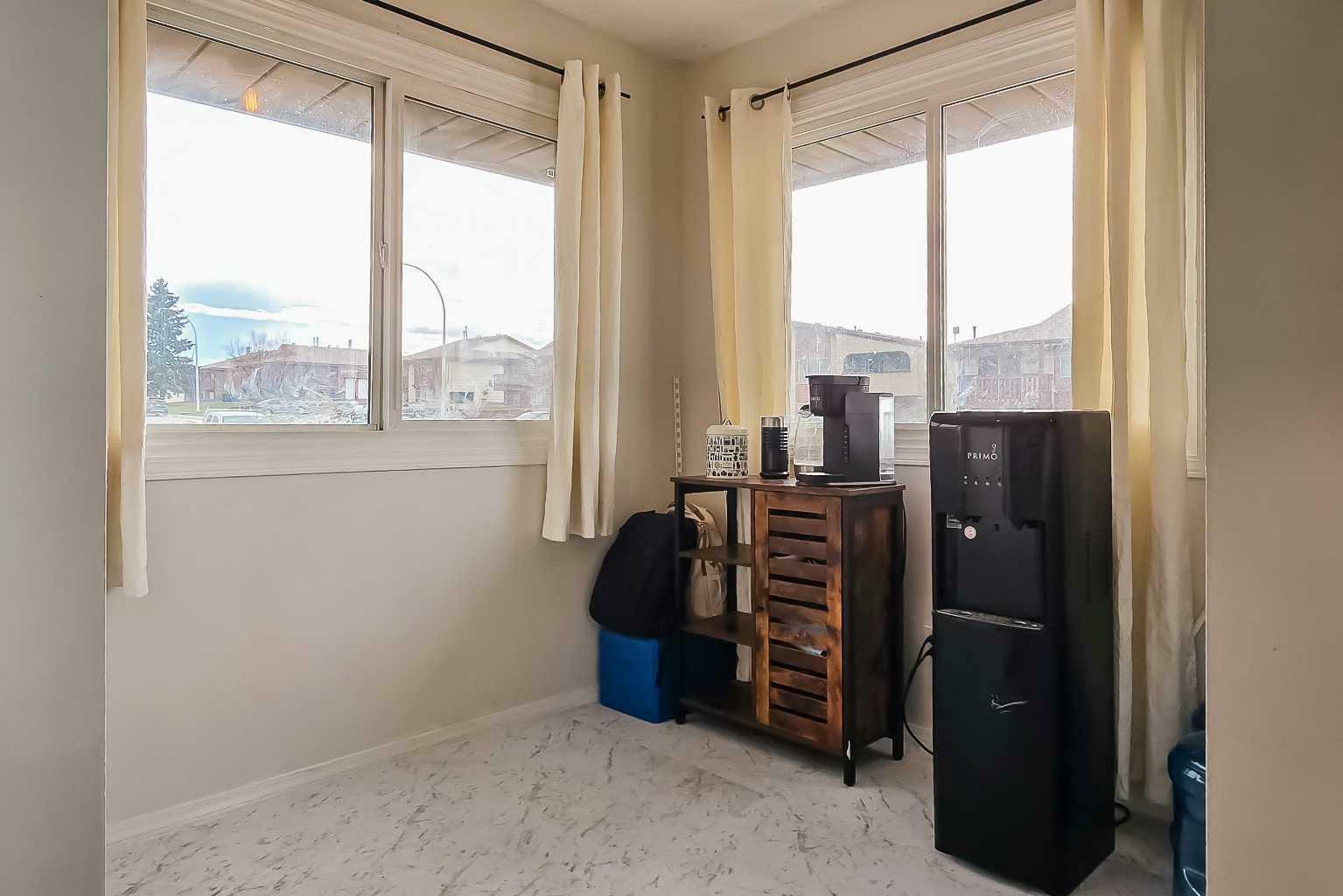Property Photo: 4504 47 Street 201 AB T4G 1P5