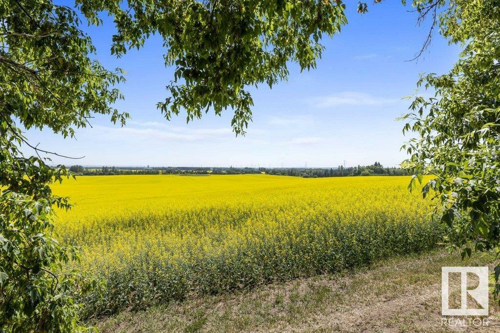 Property Photo:  21203 18 Street NW  AB T5Y 6B7 