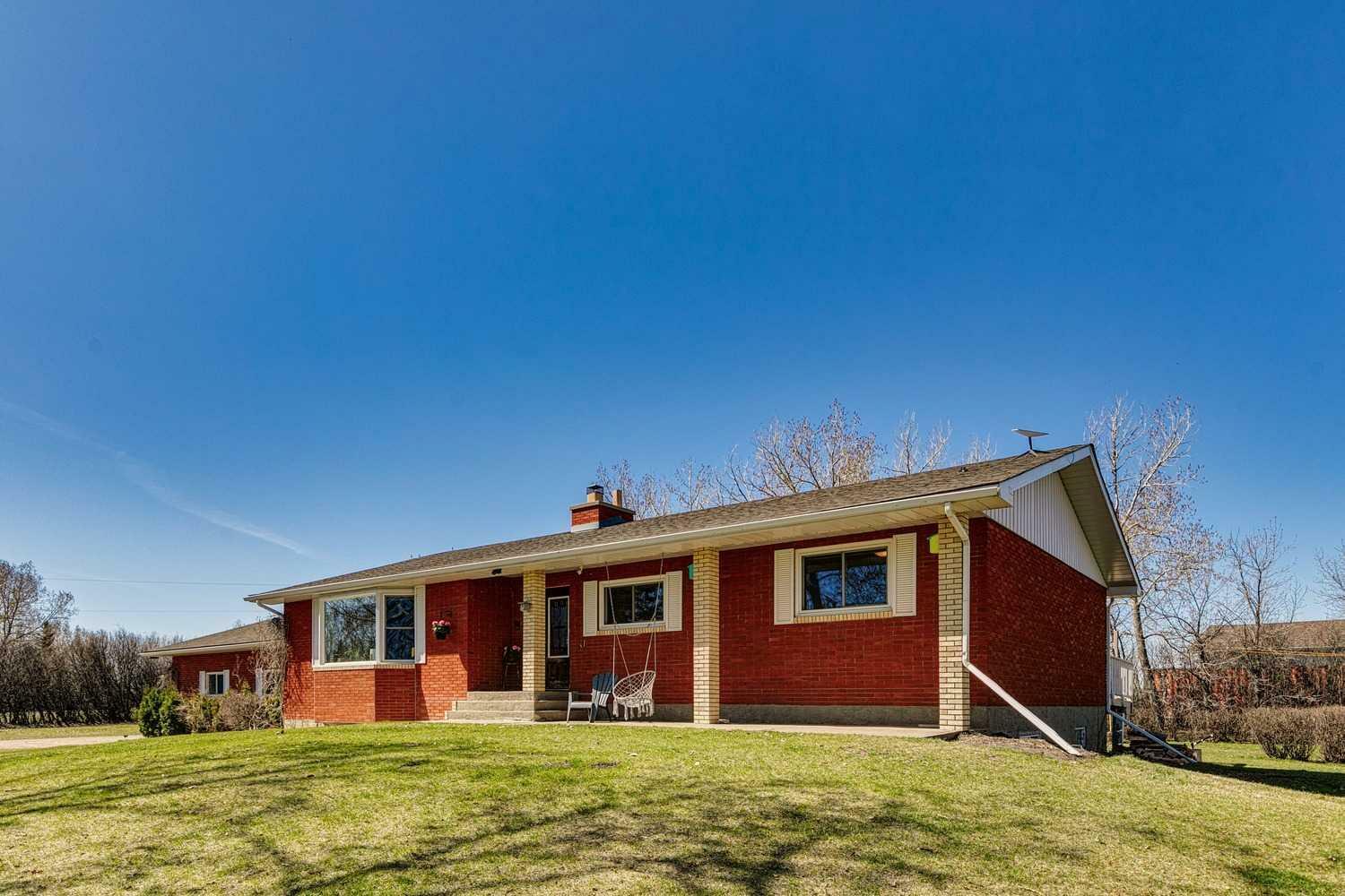 Property Photo: 11 Dry Creek Bay SW AB T4B 2Z8