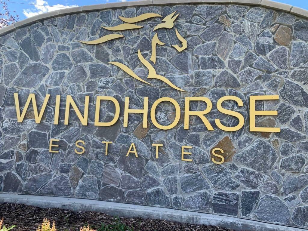 Property Photo: 9 Windhorse Road AB T3Z 0B5