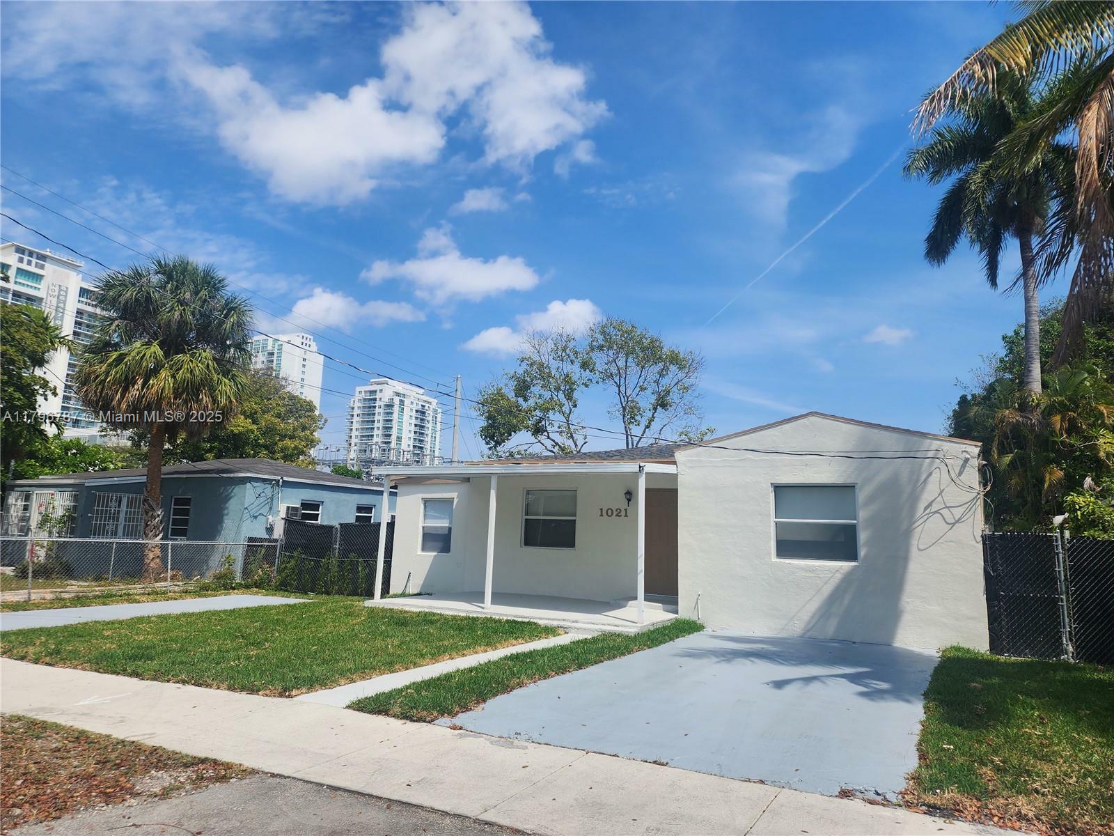 Property Photo: 1021 NW 20th Ave 0 FL 33125