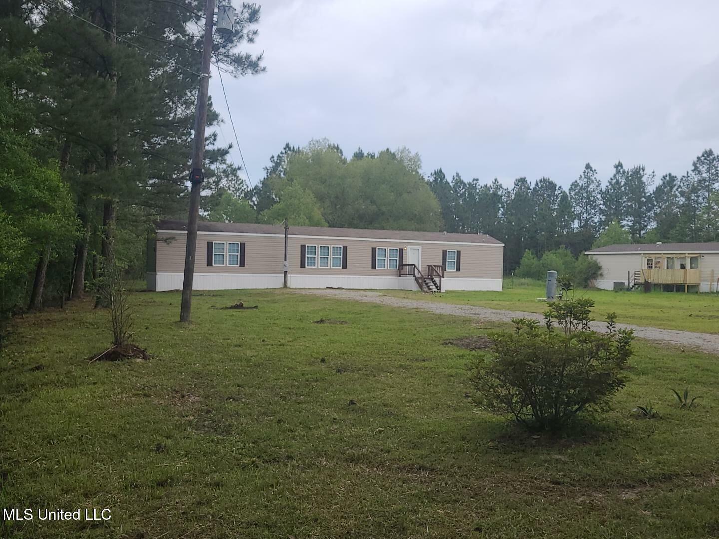Property Photo: 23428 E Dubuisson Road MS 39571
