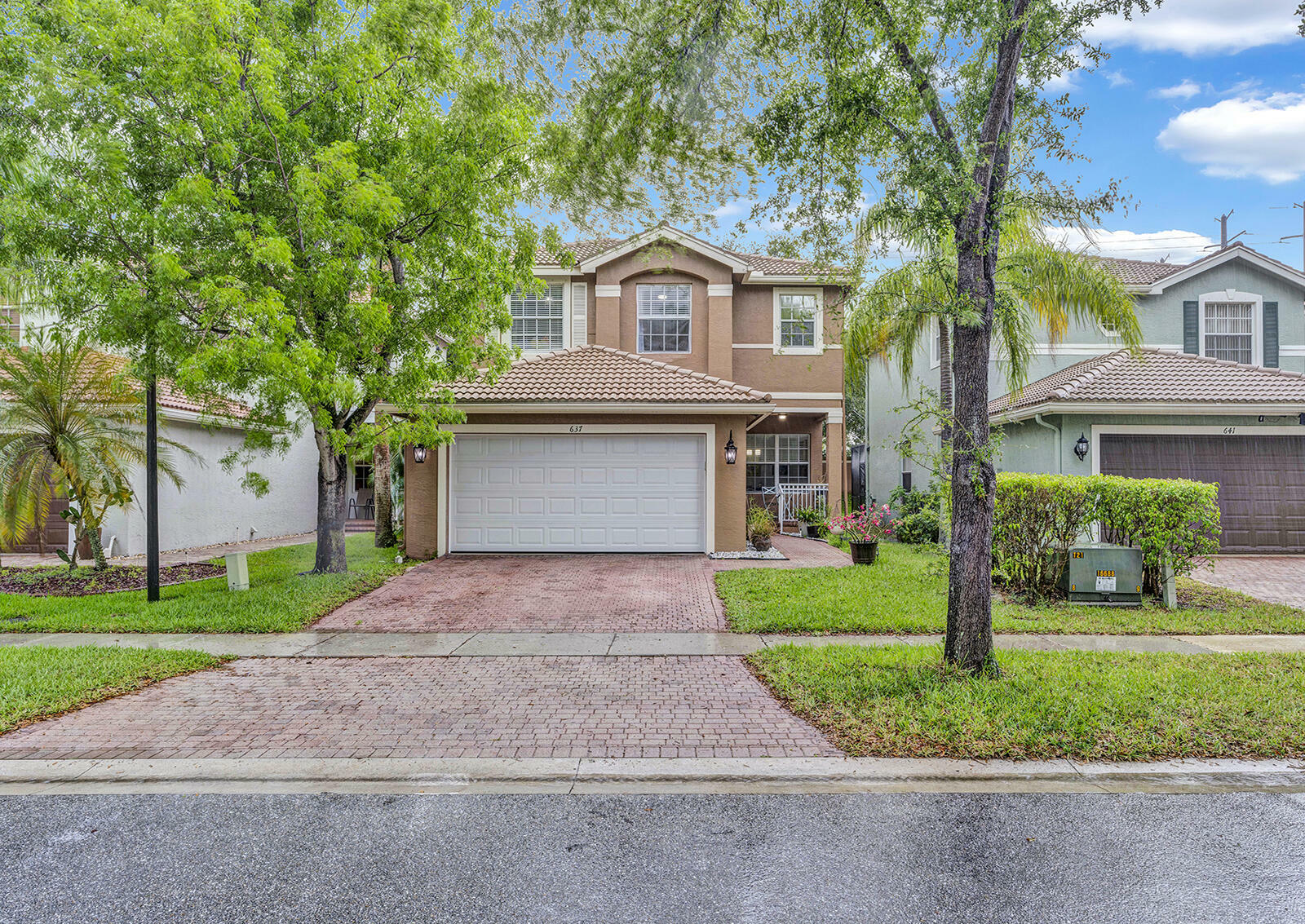 Property Photo: 637 Garden Cress Trail FL 33411