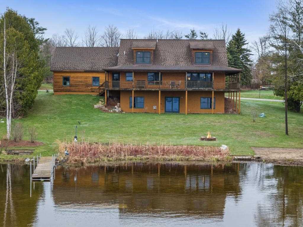 Property Photo:  8120 Susan Shore  MI 49720 