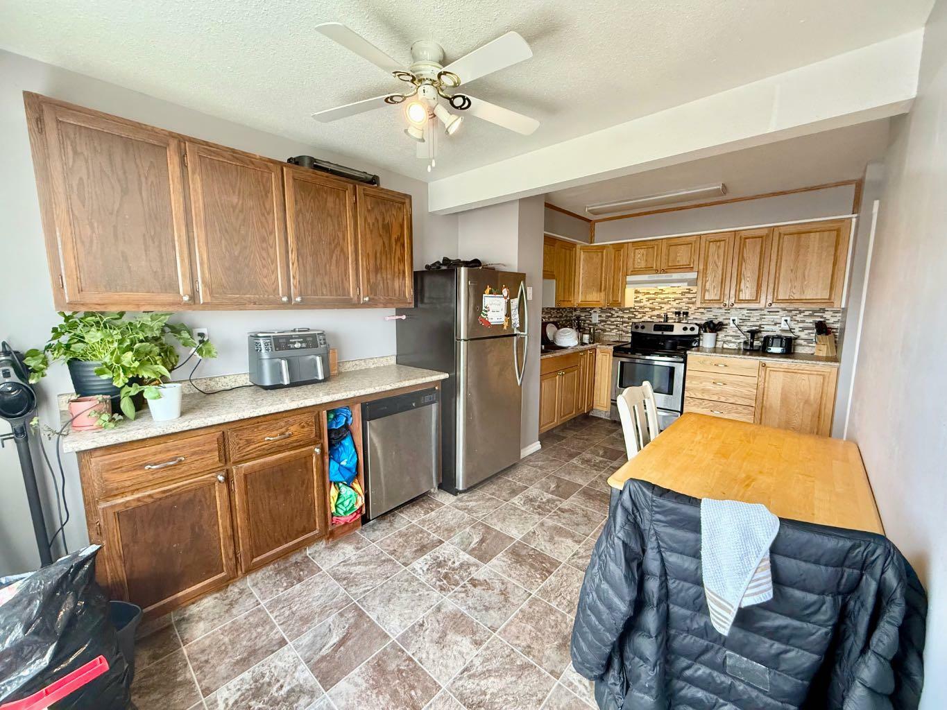 Property Photo: 110 Tamarack Avenue 32 AB T7V 1C5