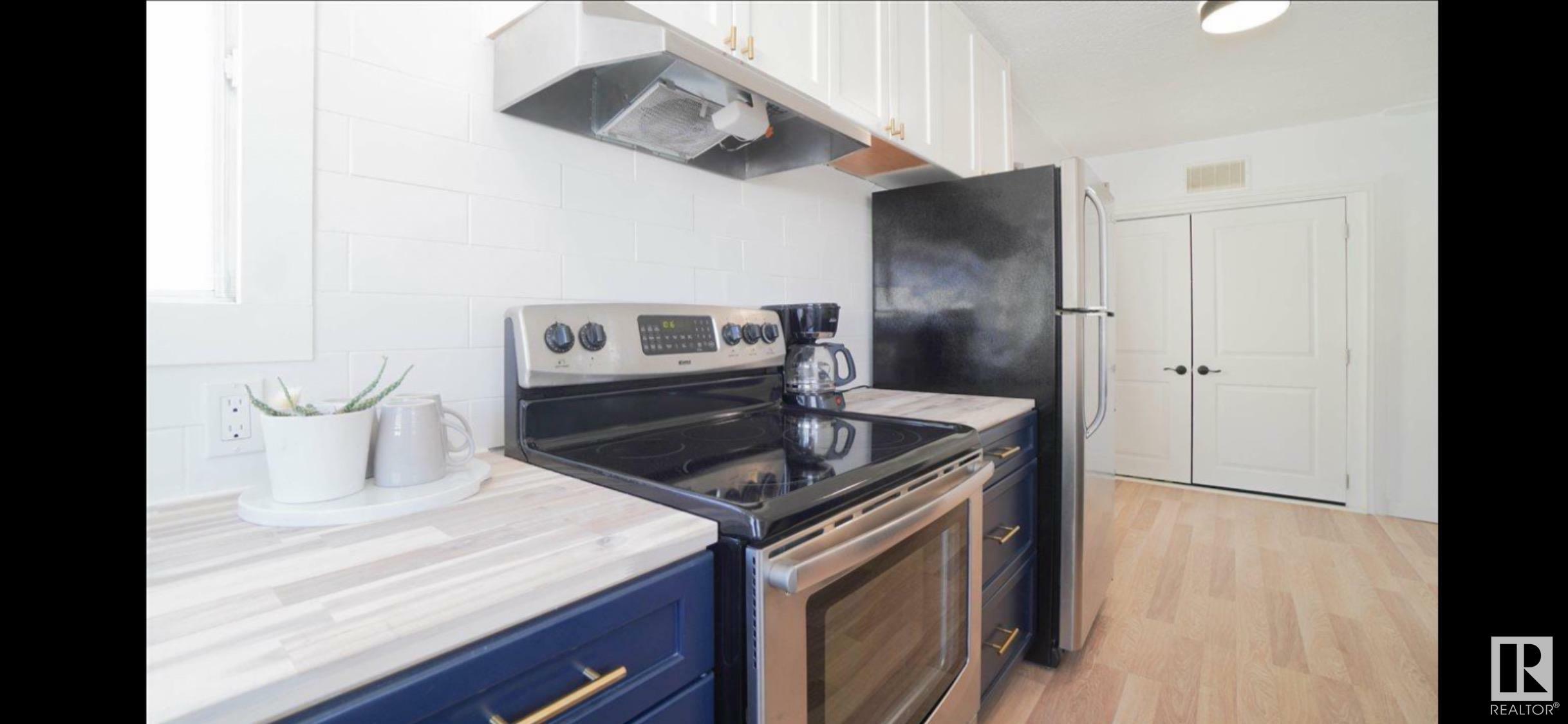 Property Photo: 11308 91 Street NW AB T5B 4A3