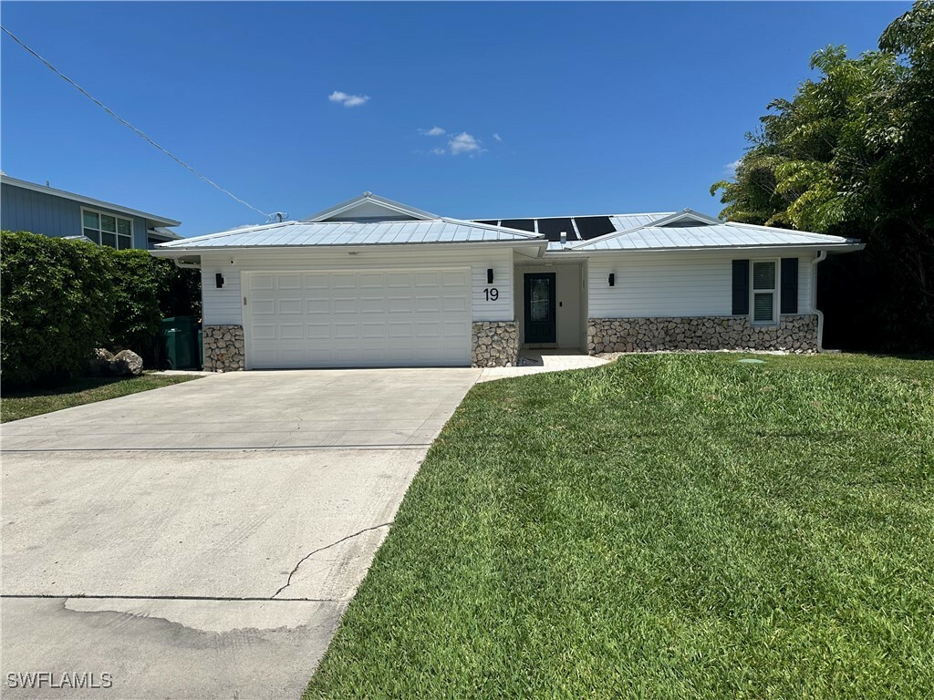 Property Photo: 19 Pelican Street E FL 34113