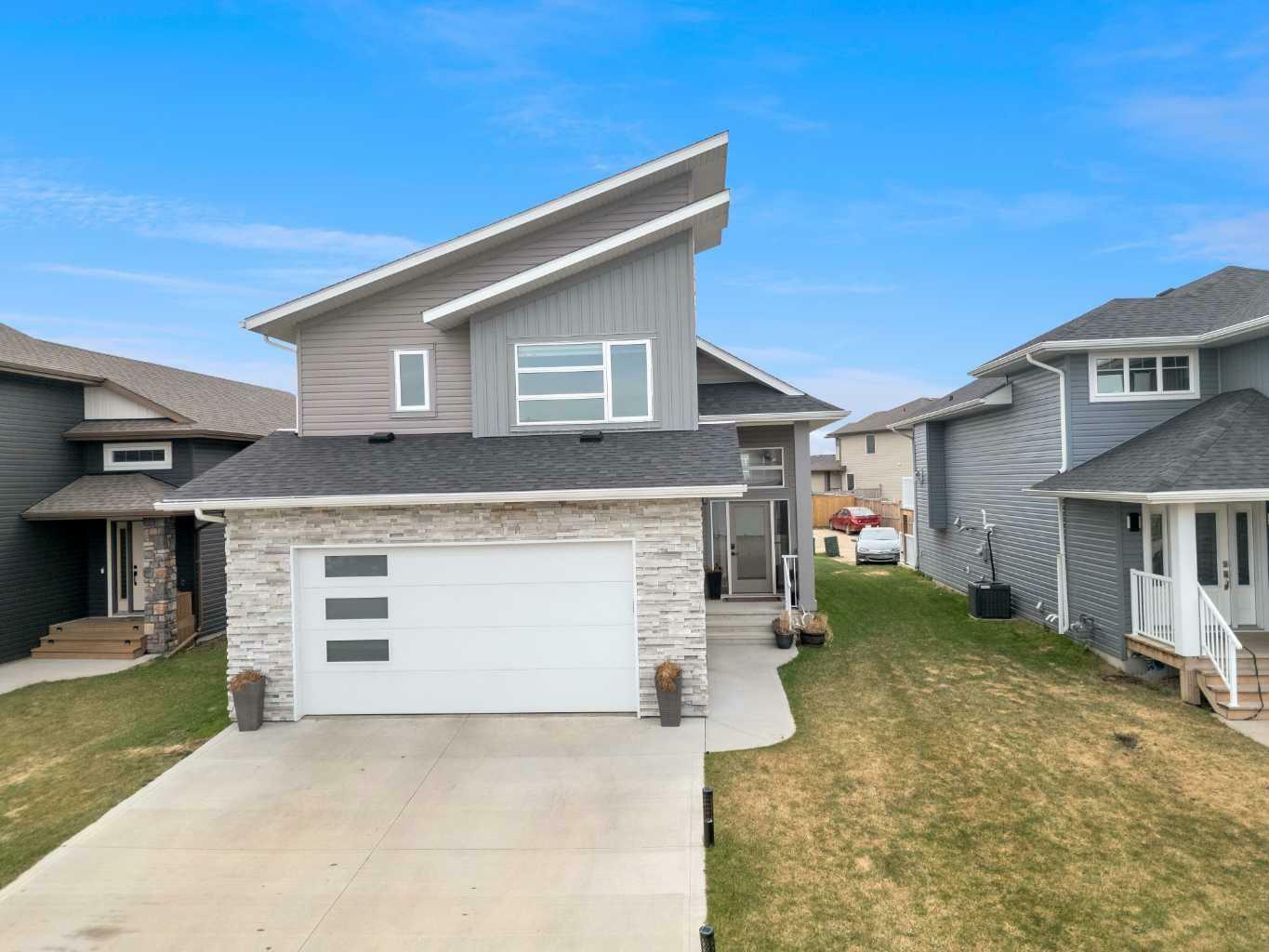 Property Photo: 57 Mackenzie Avenue AB T4L 0A6